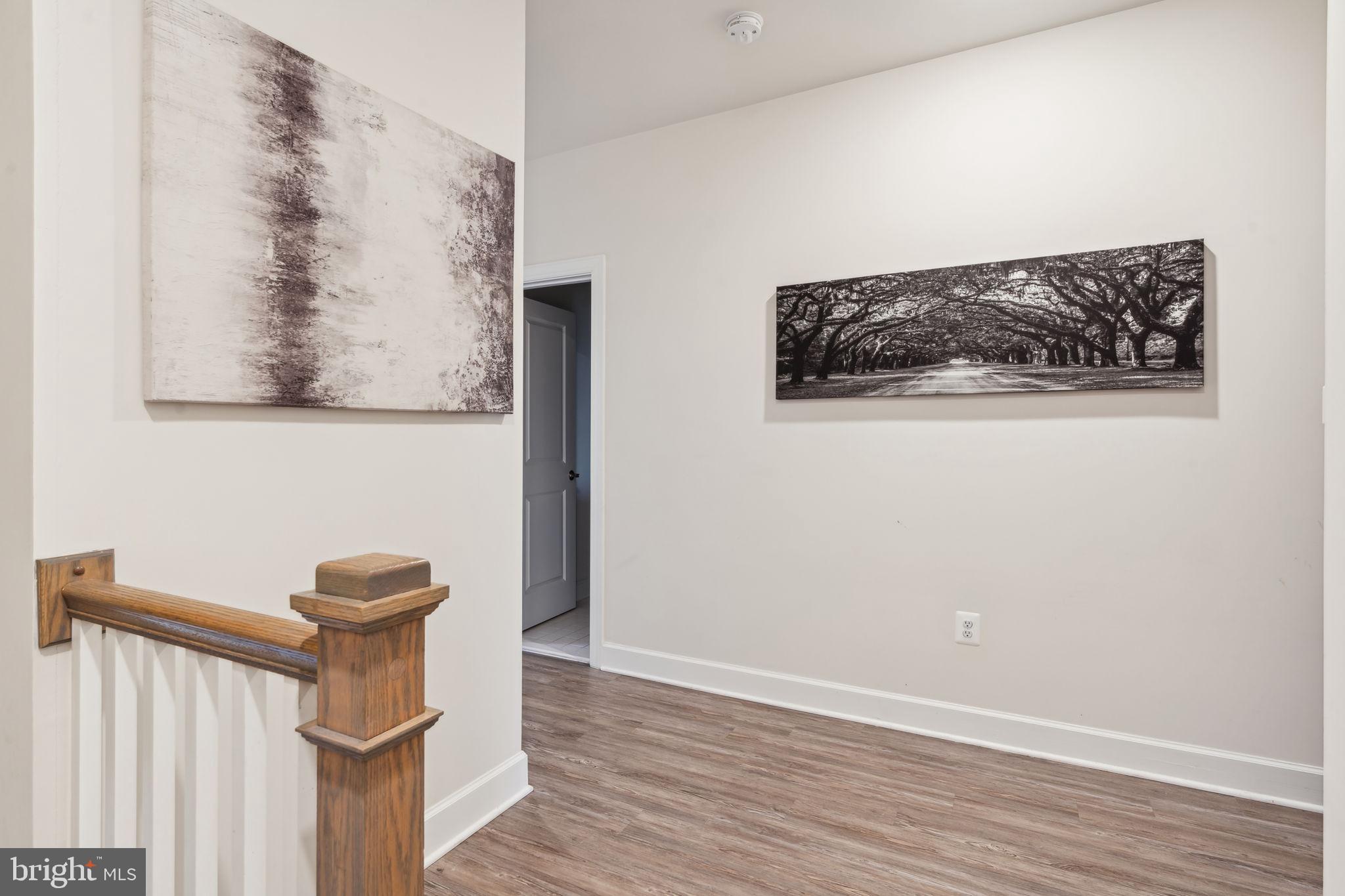 7635 Stemhart Lane Hanover, MD 21076 - Photo 28 of 28 a view of entryway with wooden floor