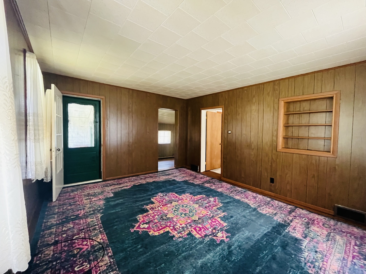 1213 East Main Street Streator, IL 61364 - Photo 6 of 18 a spacious bedroom with a bed and a dresser