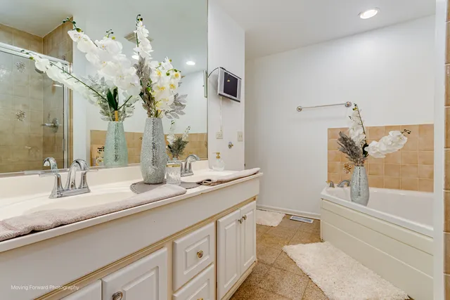 a bathroom with a sink a vanity and a mirror