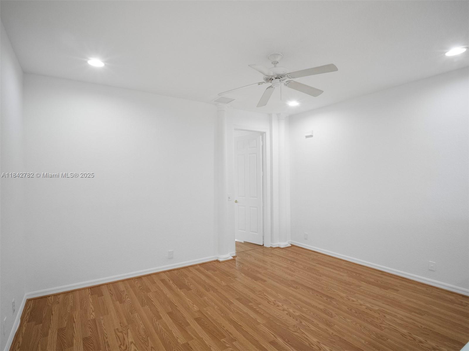 43 Lancaster Road Boynton Beach, FL 33426 - Photo 20 of 29 wooden floor in an empty room