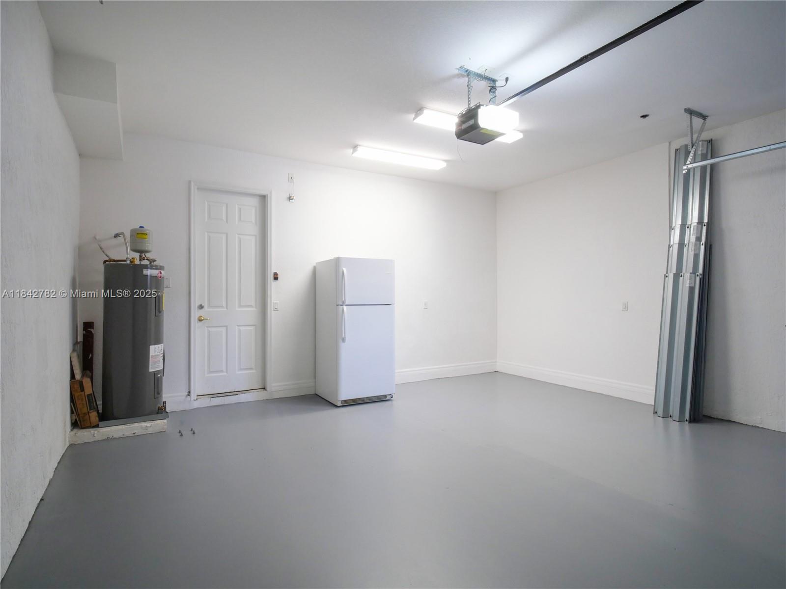 43 Lancaster Road Boynton Beach, FL 33426 - Photo 24 of 29 a view of an empty room with a ceiling fan