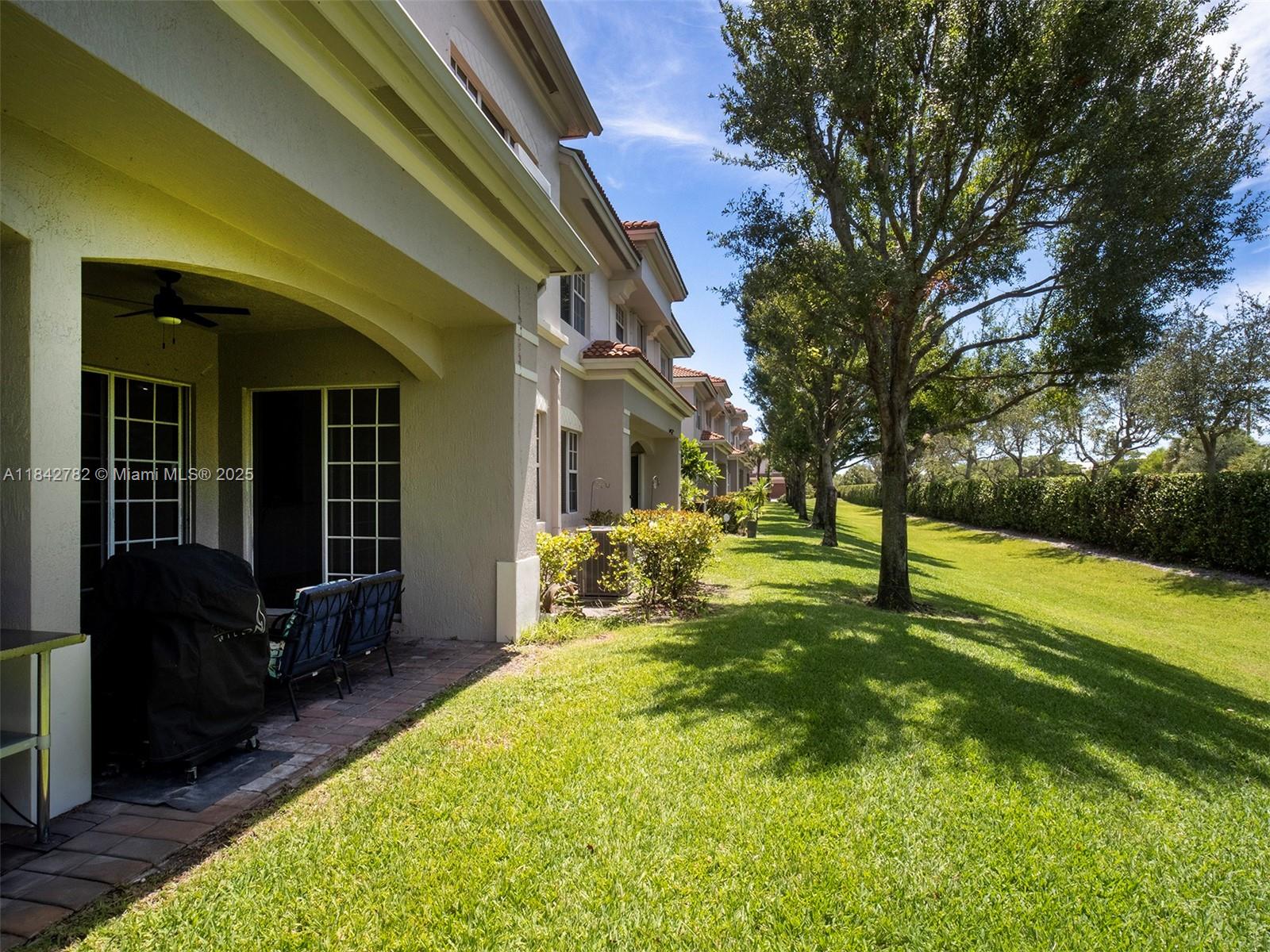 43 Lancaster Road Boynton Beach, FL 33426 - Photo 26 of 29 a view of a house with a yard