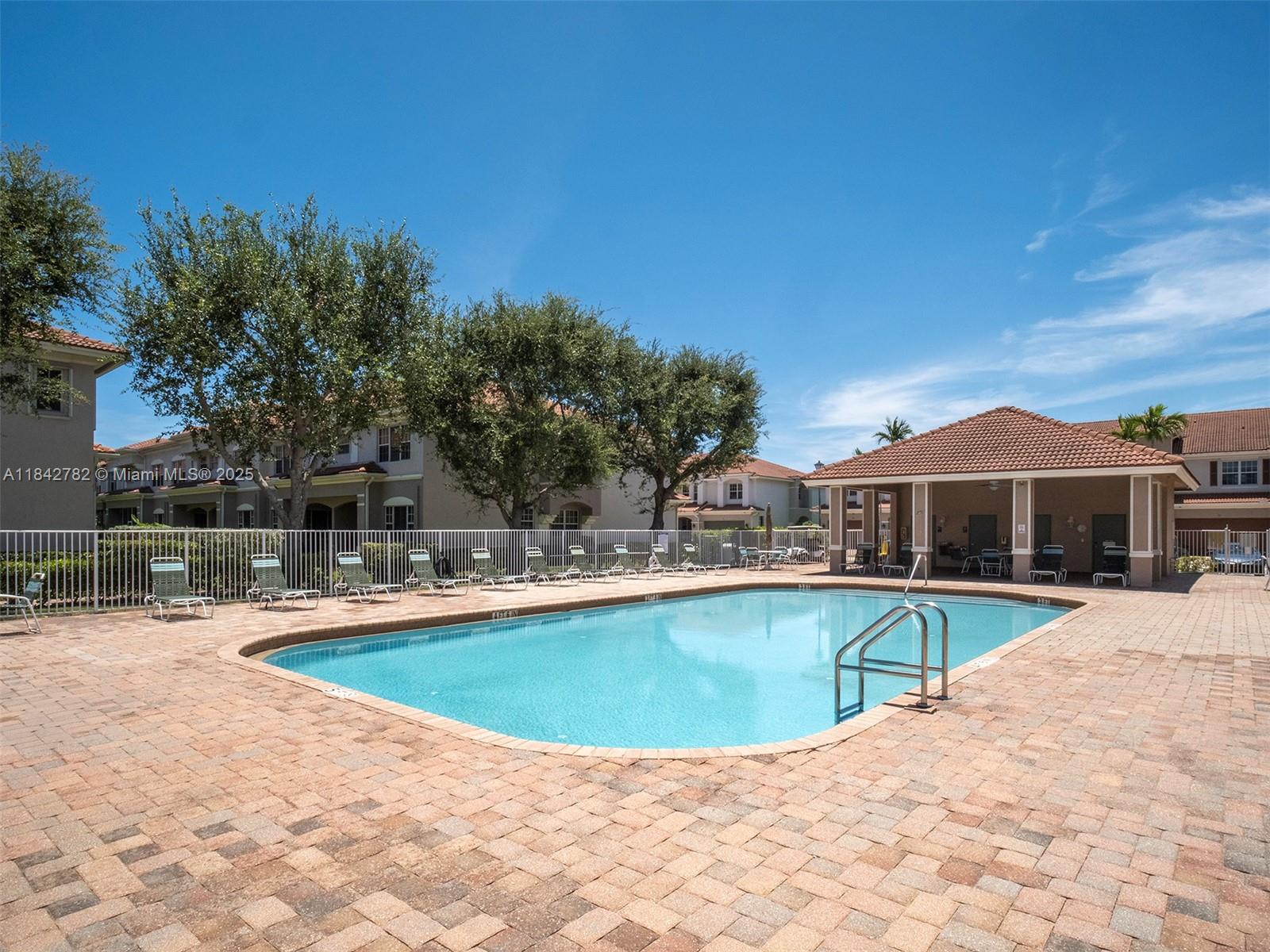 43 Lancaster Road Boynton Beach, FL 33426 - Photo 28 of 29 a view of a swimming pool with a patio