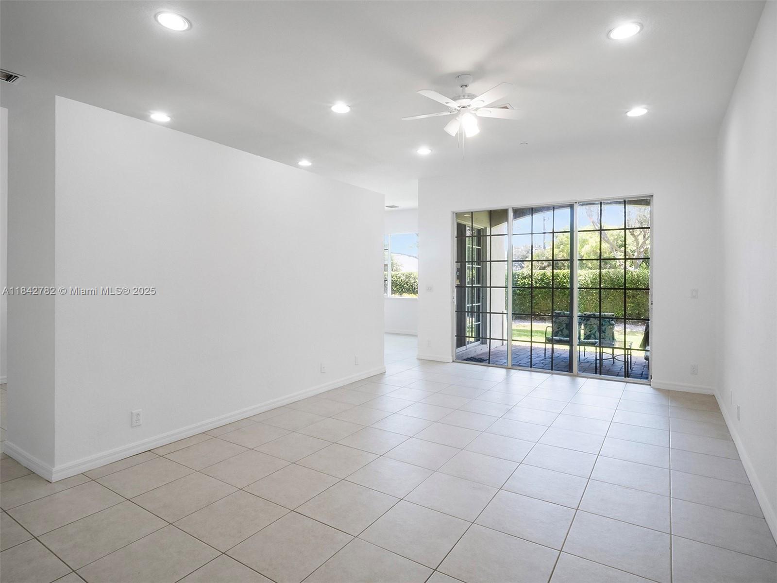 43 Lancaster Road Boynton Beach, FL 33426 - Photo 7 of 29 a view of an empty room with a window
