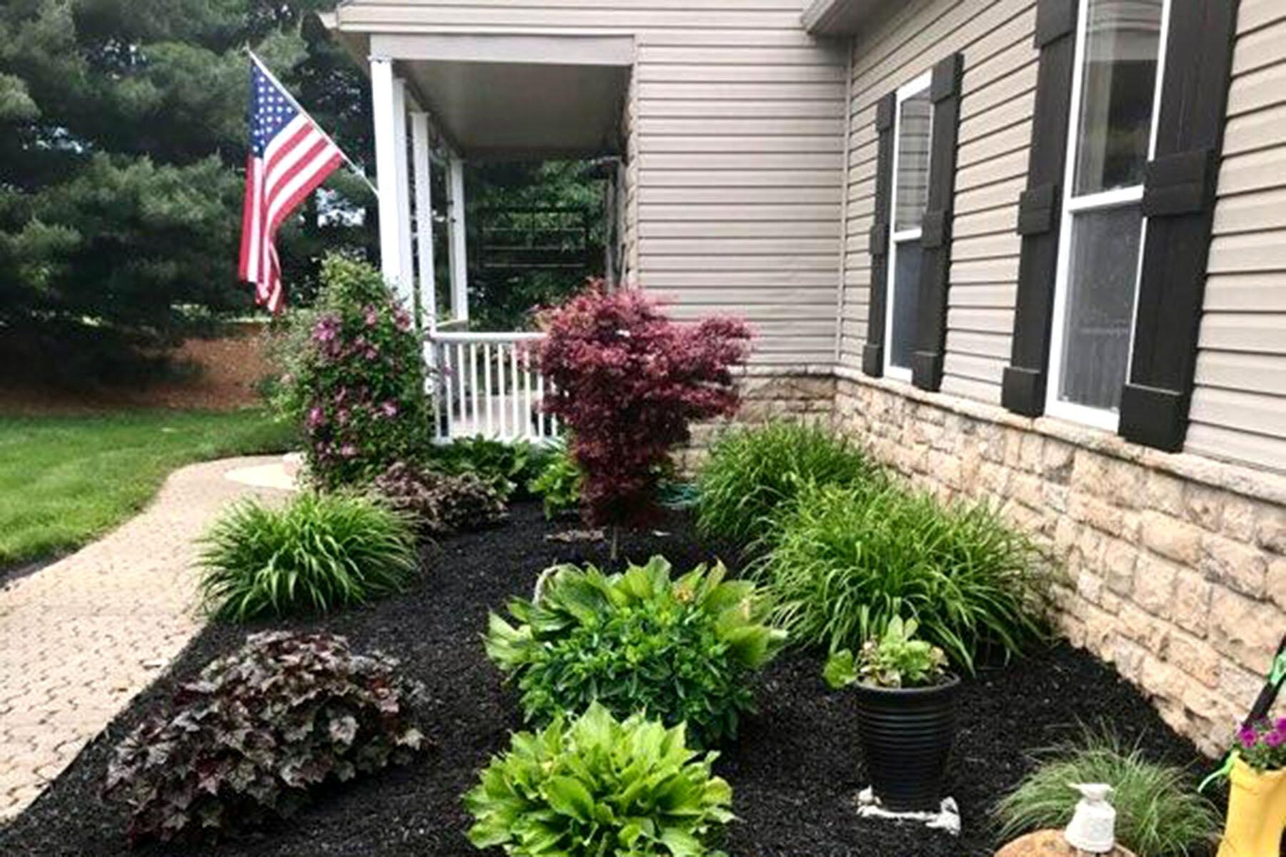 1704 Ford Road Delaware, OH 43015 - Photo 46 of 54 Perennial beds in summer
