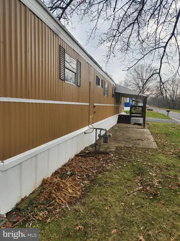 a view of a back yard of the house