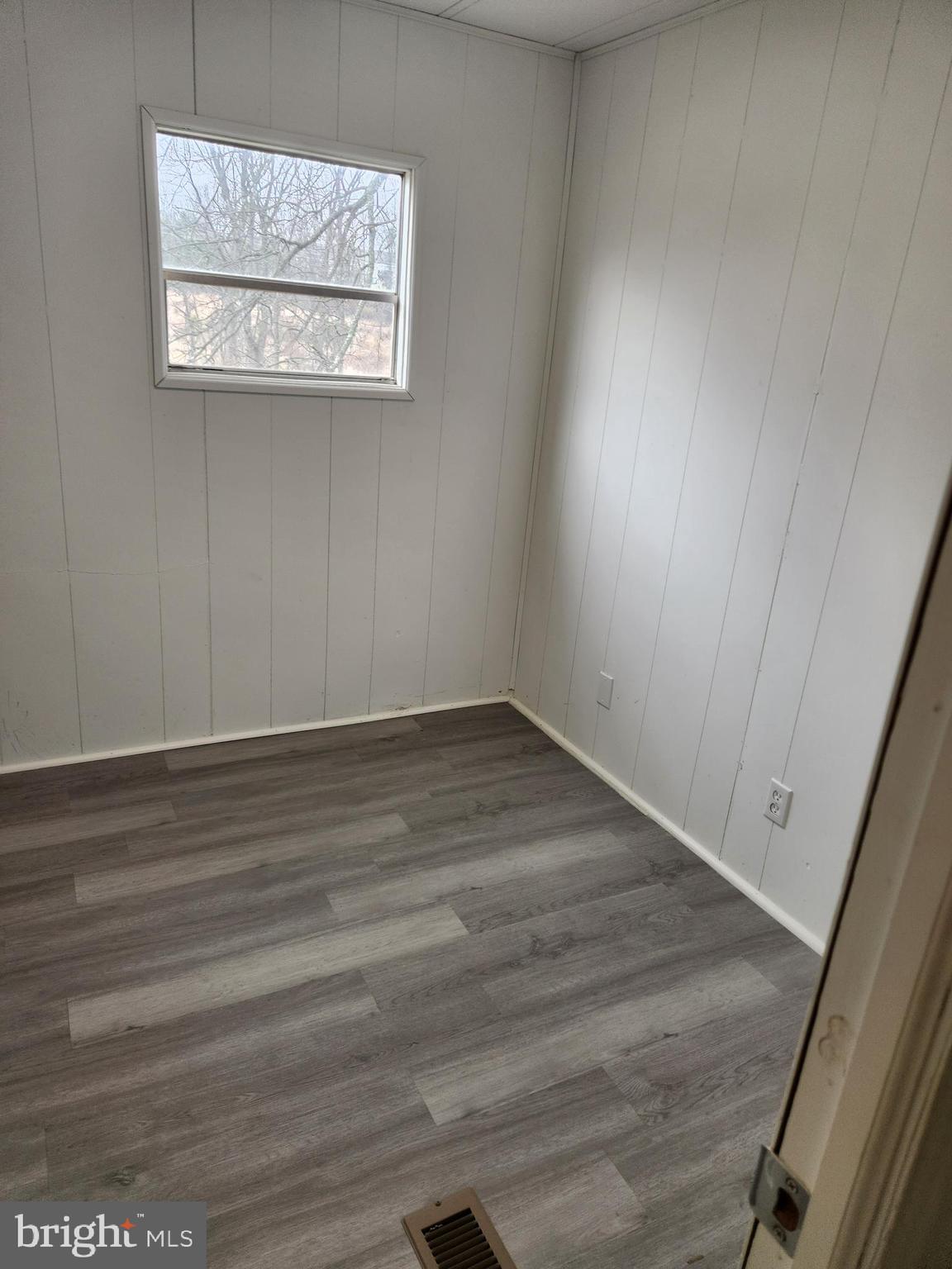 46 Chipawa Avenue Dover, PA 17315 - Photo 6 of 12 a view of a hallway with wooden floor