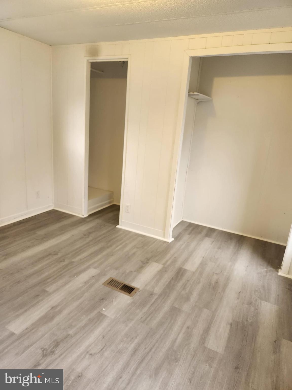 46 Chipawa Avenue Dover, PA 17315 - Photo 9 of 12 an empty room with wooden floor