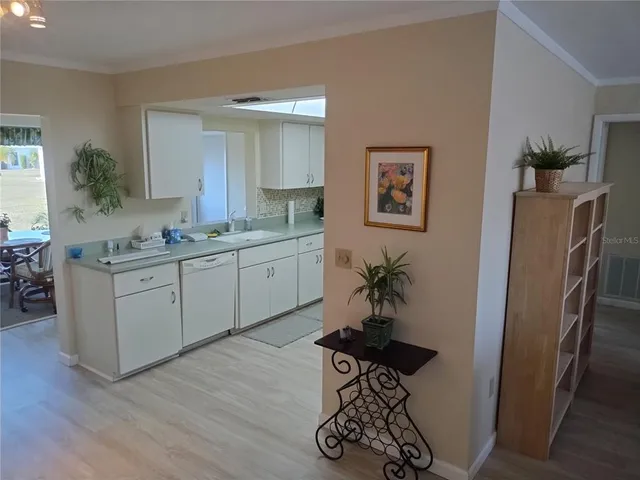 a outdoor dining space with furniture and outdoor view