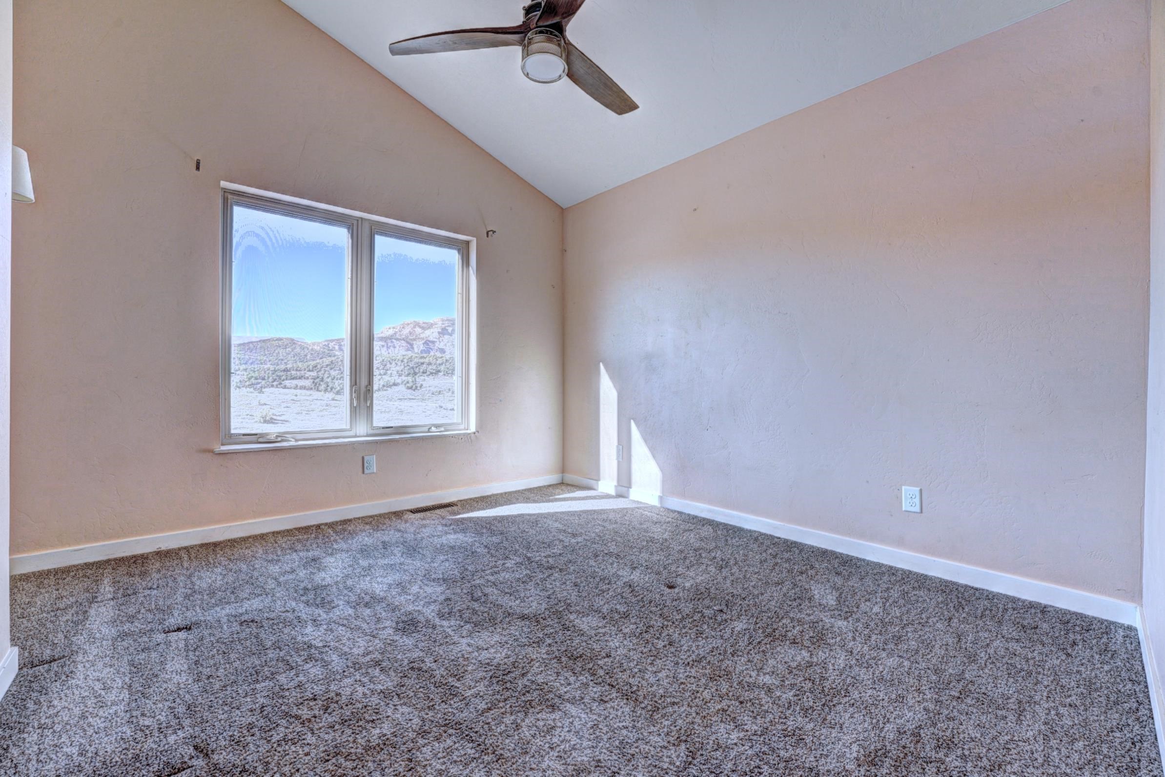 1570-45 45 1/2 Road De Beque, CO 81630 - Photo 15 of 35 a view of an empty room with a window