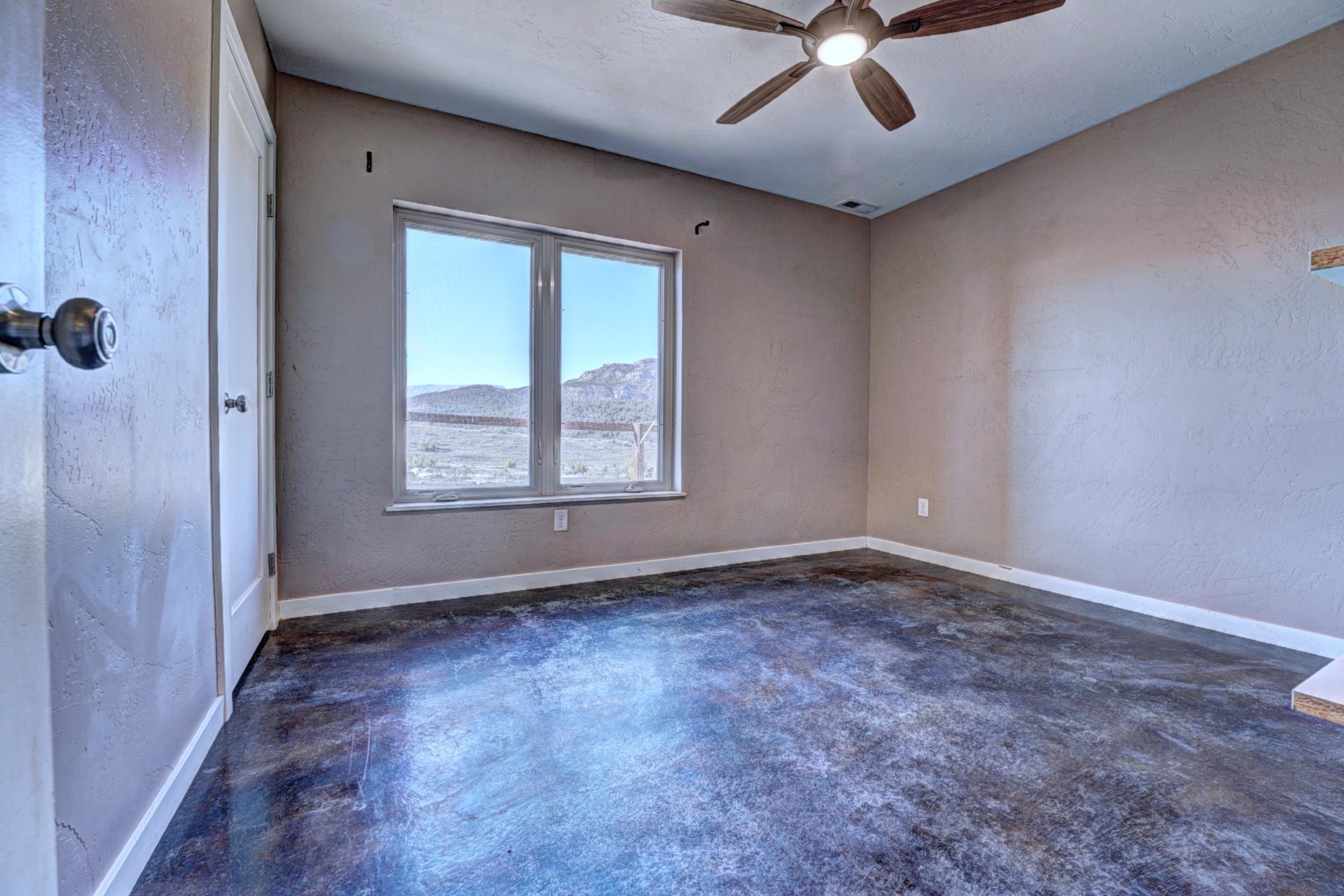 1570-45 45 1/2 Road De Beque, CO 81630 - Photo 22 of 35 a view of an empty room with a window