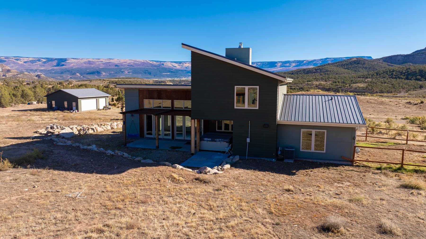 1570-45 45 1/2 Road De Beque, CO 81630 - Photo 26 of 35 a front view of a house with a yard
