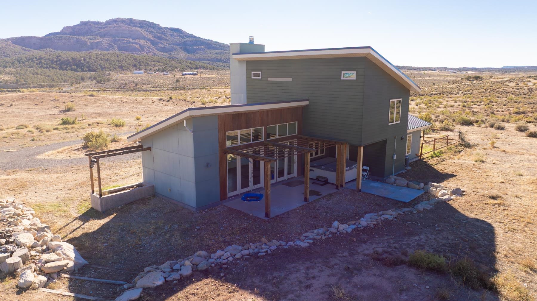 1570-45 45 1/2 Road De Beque, CO 81630 - Photo 27 of 35 a view of a house with a yard