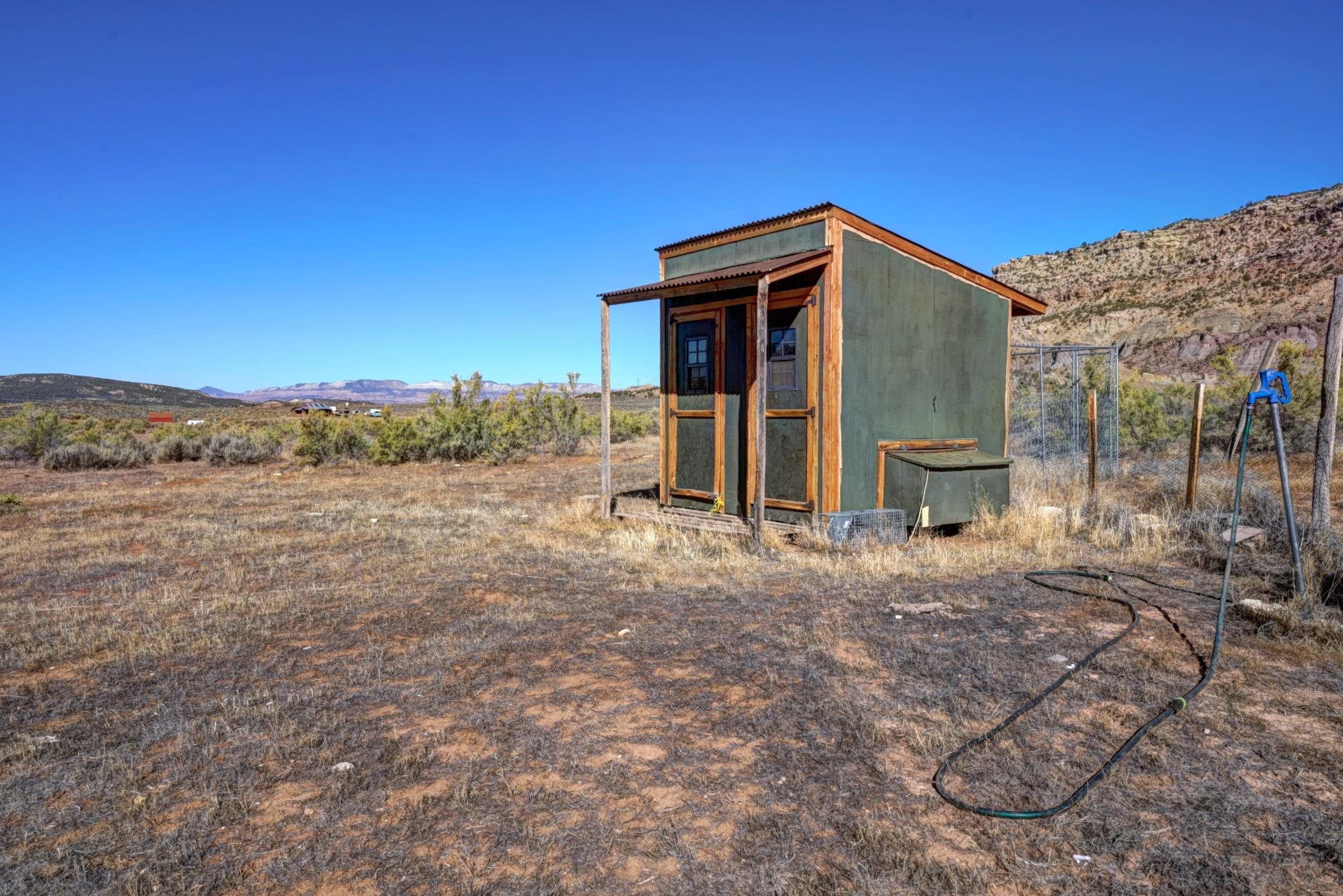 1570-45 45 1/2 Road De Beque, CO 81630 - Photo 33 of 35 a view of backyard of house and car parked