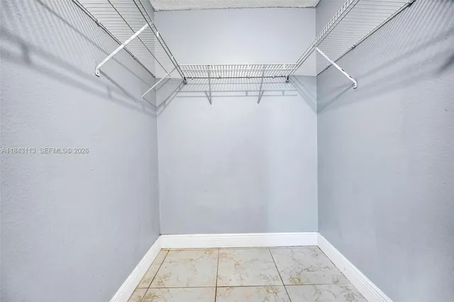 a view of a room with racks on the wall