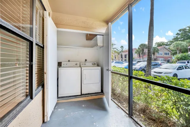 a view of a balcony with city view