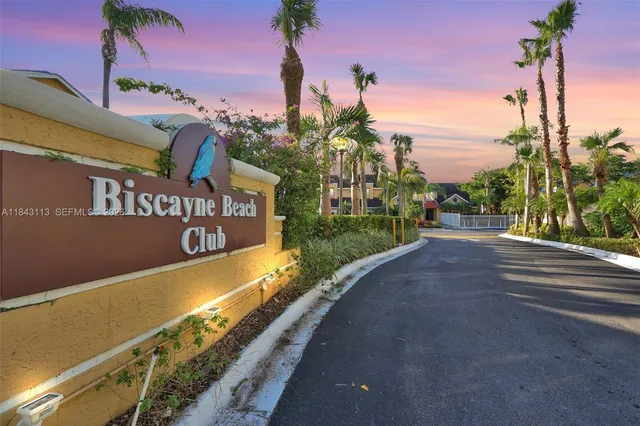 a view of a street with a building in the background