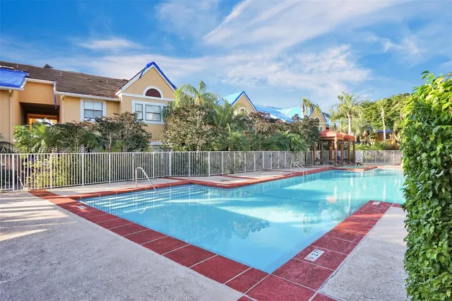 a view of a house with a swimming pool