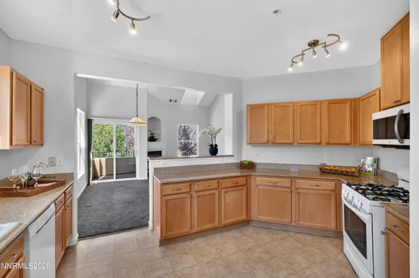 a kitchen that has a sink and a window