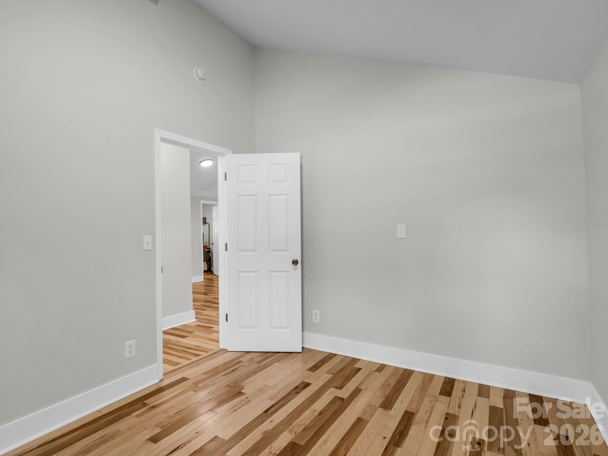 5923 Highway 14 Landrum, SC 29356 - Photo 11 of 15 a view of an empty room and wooden floor