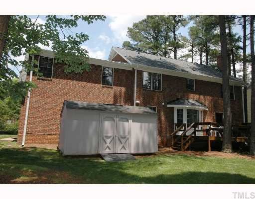 8304 Mourning Dove Road Raleigh, NC 27615 - Photo 8 of 8 a view of a house with a yard