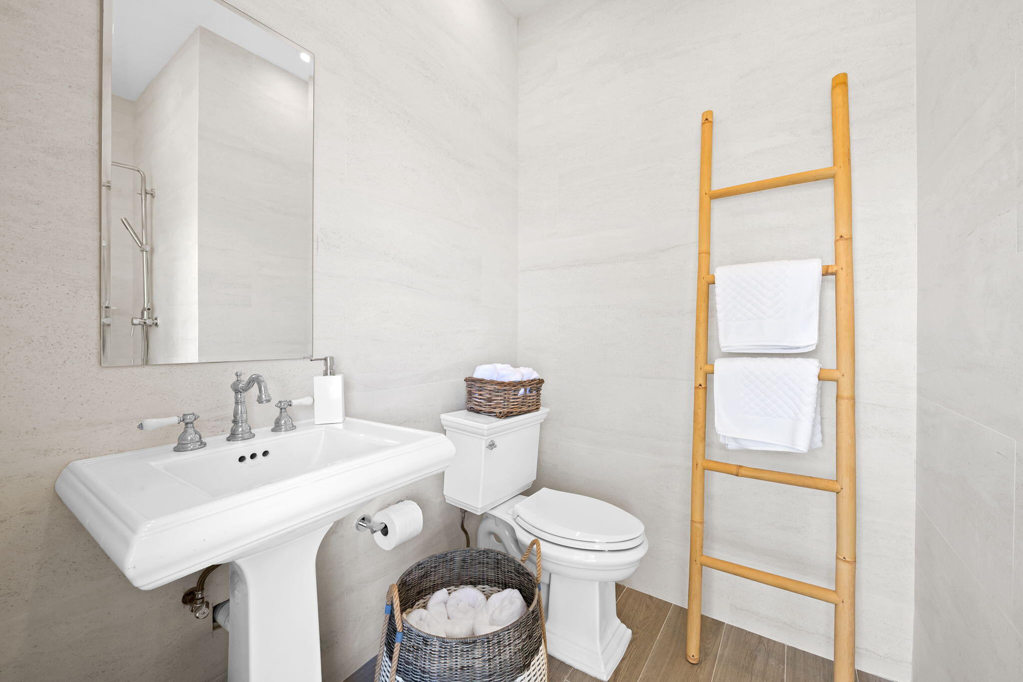 4885 Regency Court Boca Raton, FL 33434 - Photo 17 of 38 a bathroom with a toilet a sink and a mirror