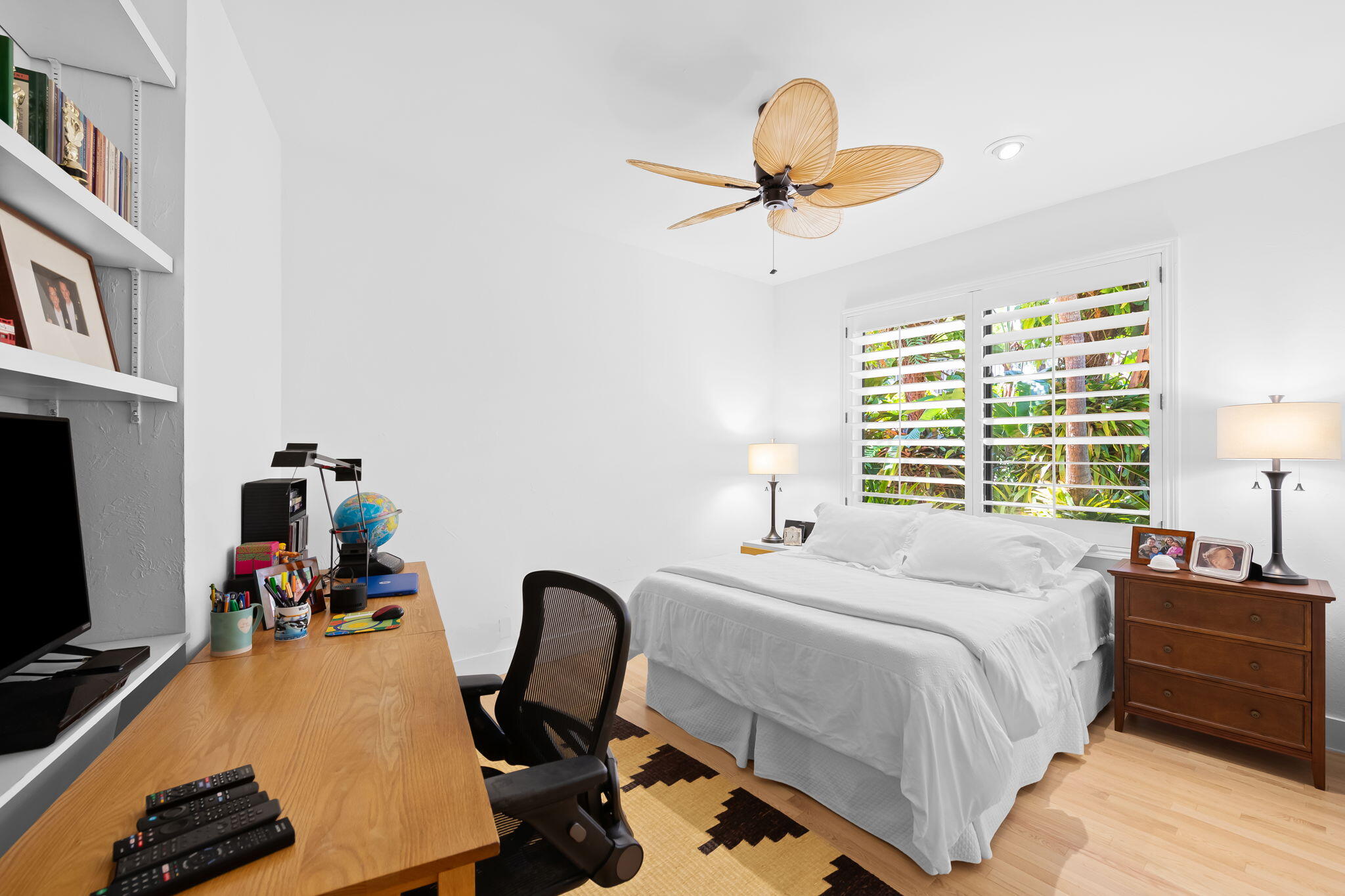 4885 Regency Court Boca Raton, FL 33434 - Photo 21 of 38 a bedroom with a bed and a chandelier