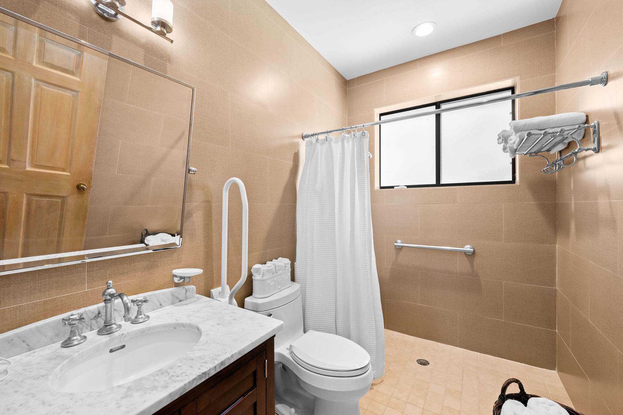 4885 Regency Court Boca Raton, FL 33434 - Photo 22 of 38 a bathroom with a sink toilet and shower