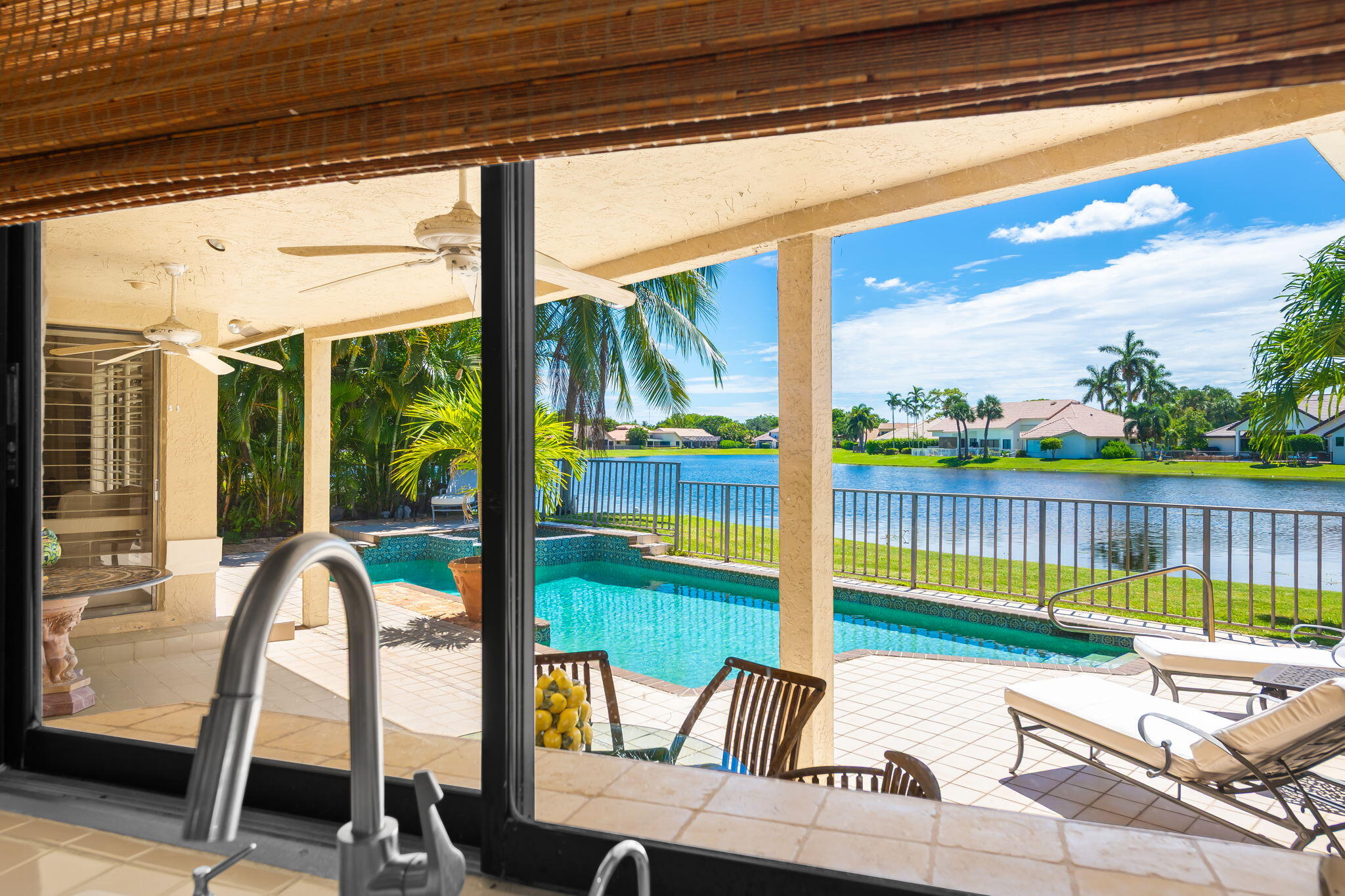4885 Regency Court Boca Raton, FL 33434 - Photo 25 of 38 a view of a chairs and tables in the balcony