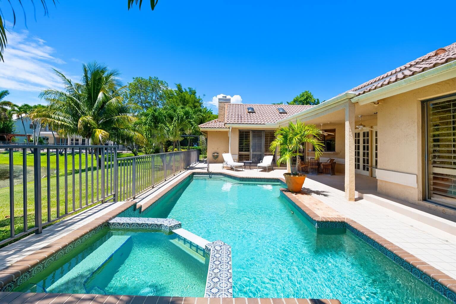 4885 Regency Court Boca Raton, FL 33434 - Photo 29 of 38 a view of a house with pool