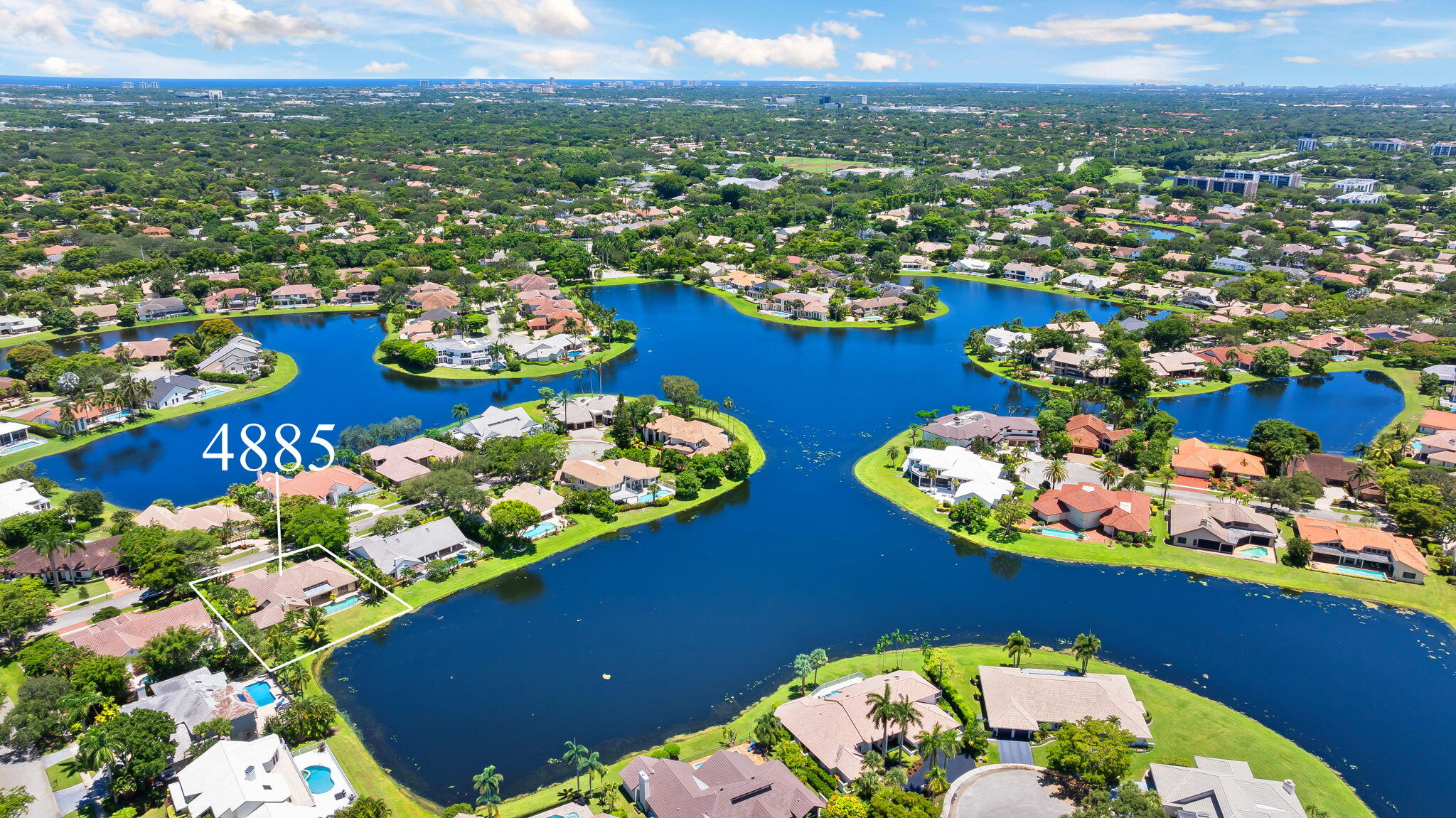 4885 Regency Court Boca Raton, FL 33434 - Photo 35 of 38 an aerial view of a house with a ocean view