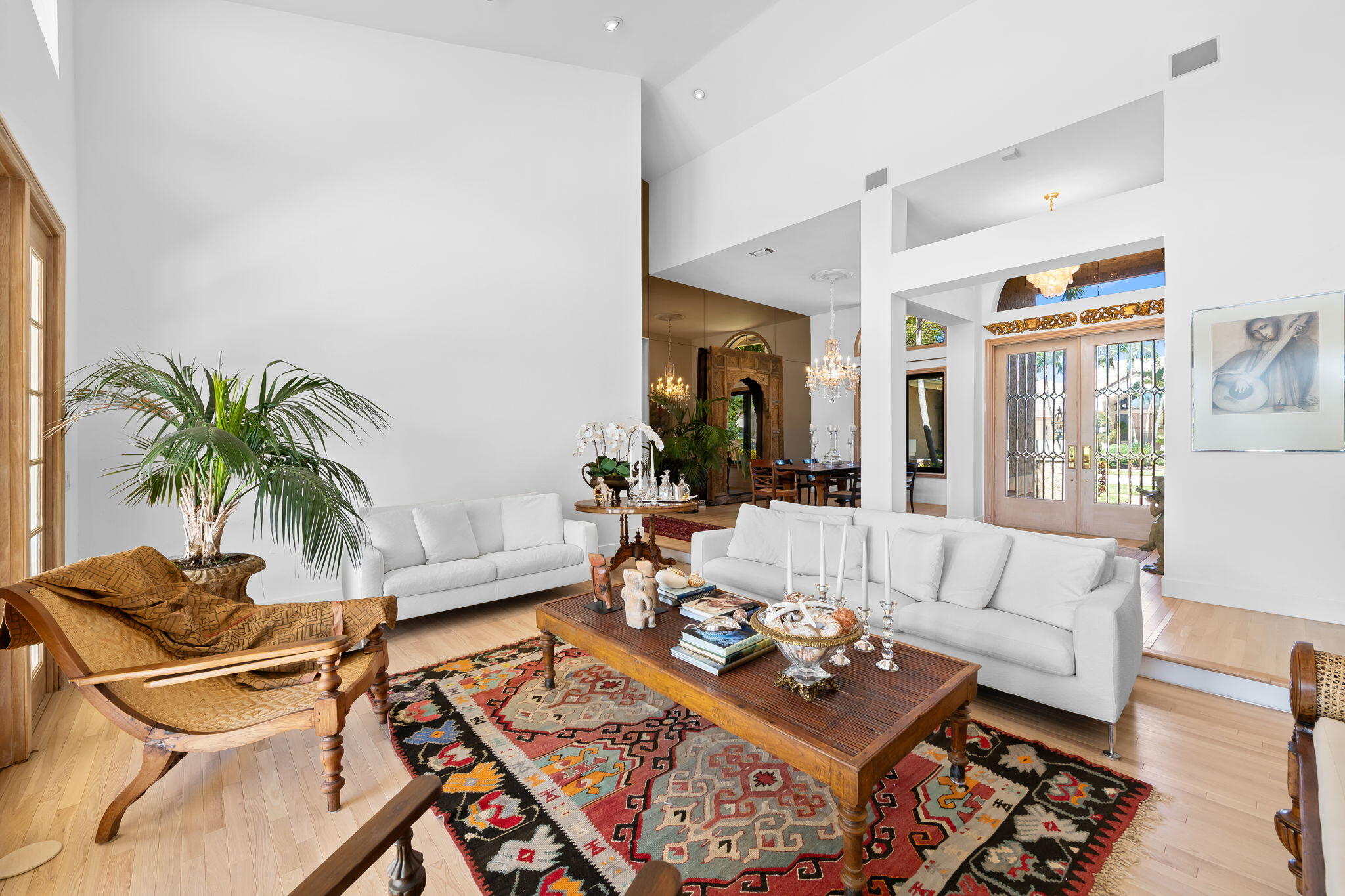 4885 Regency Court Boca Raton, FL 33434 - Photo 4 of 38 a living room with furniture and a rug