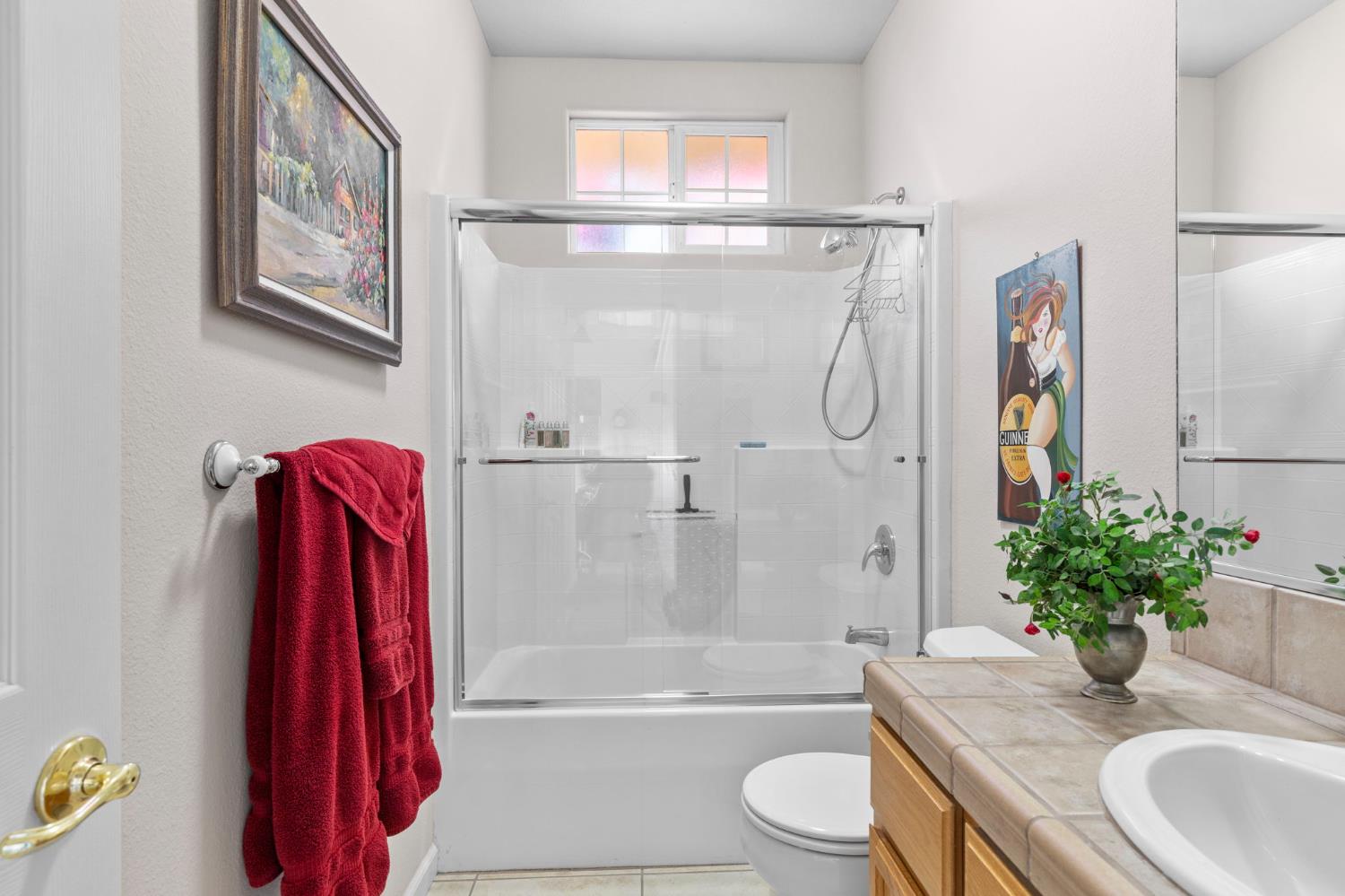 3235 Hagen Road Valley Springs, CA 95252 - Photo 18 of 40 a bathroom with a granite countertop sink a toilet and shower