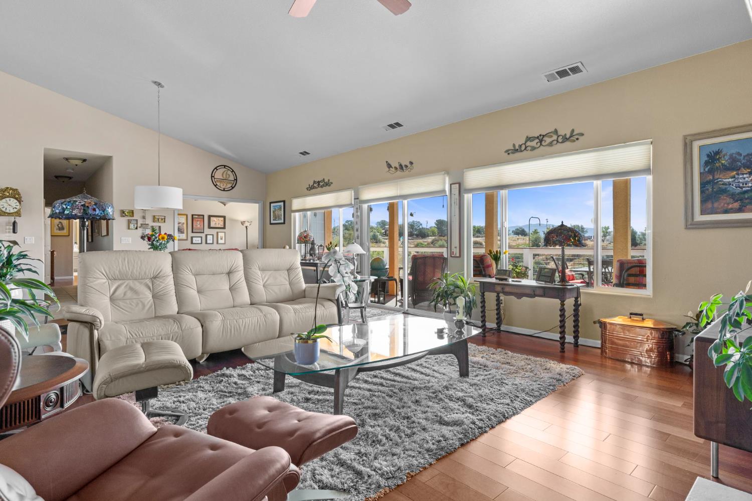 3235 Hagen Road Valley Springs, CA 95252 - Photo 2 of 40 a living room with furniture and a large window