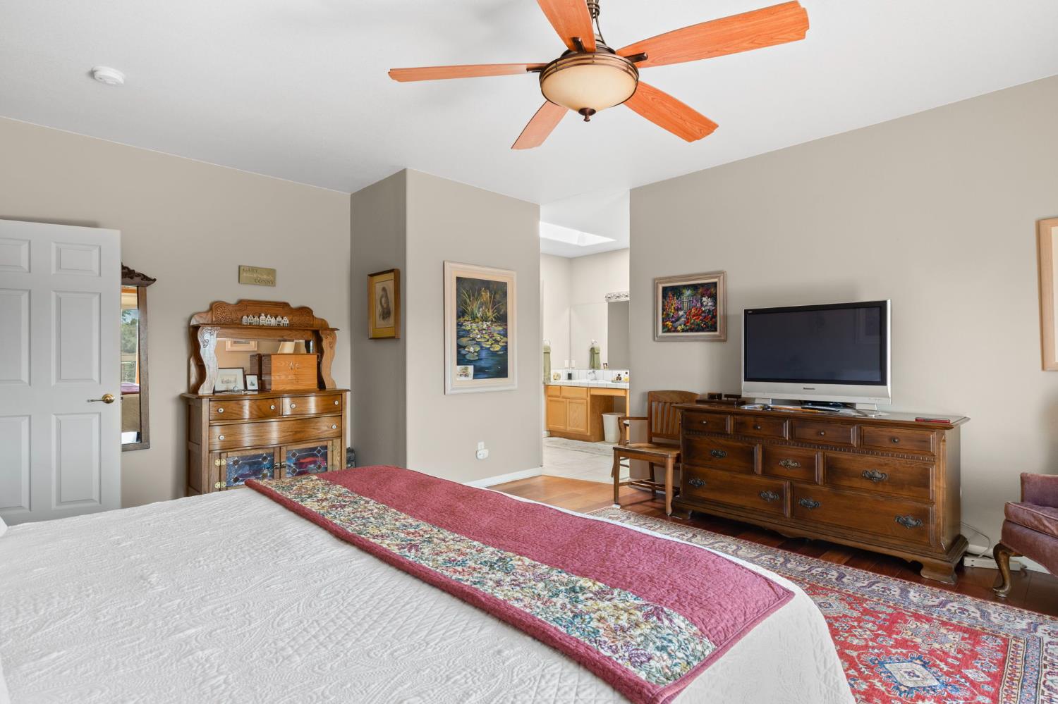 3235 Hagen Road Valley Springs, CA 95252 - Photo 22 of 40 a bedroom with a bed and a flat screen tv