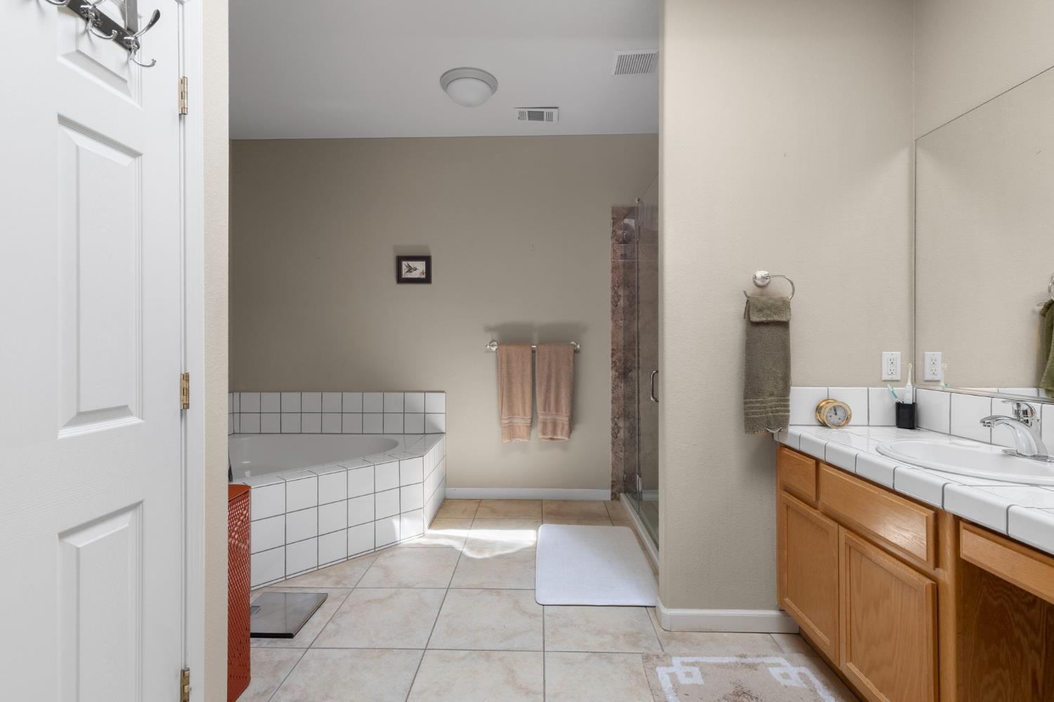3235 Hagen Road Valley Springs, CA 95252 - Photo 23 of 40 a bathroom with a sink and a mirror