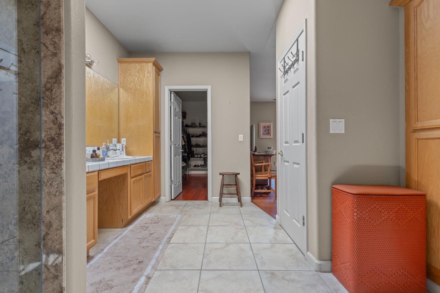 3235 Hagen Road Valley Springs, CA 95252 - Photo 25 of 40 a large bathroom with a glass door shower and sink