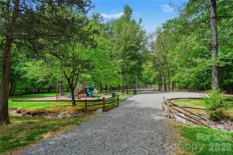 a view of a park with swings