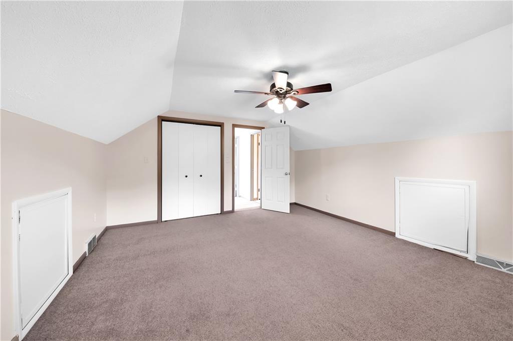 487 Ridge Road Hickory, PA 15340 - Photo 11 of 25 a view of a big room with chandelier fan and windows
