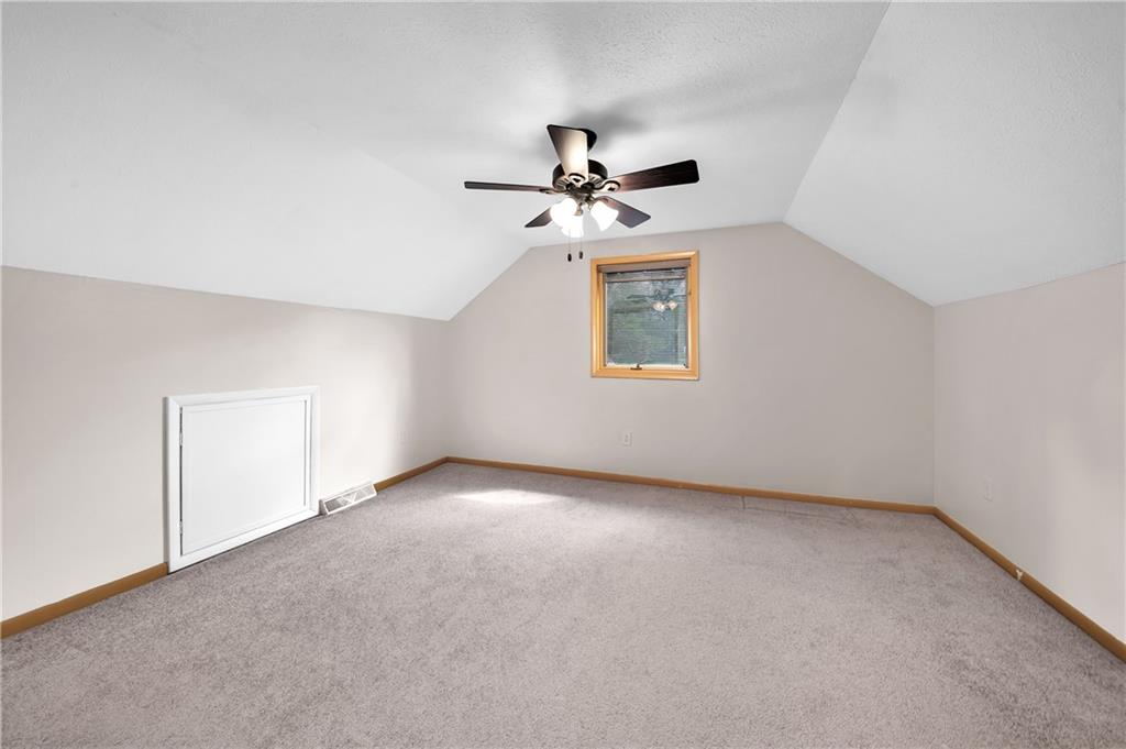 487 Ridge Road Hickory, PA 15340 - Photo 15 of 25 a view of a room with a ceiling fan and a window