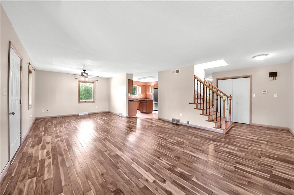 487 Ridge Road Hickory, PA 15340 - Photo 4 of 25 a view of a big room with wooden floor and windows