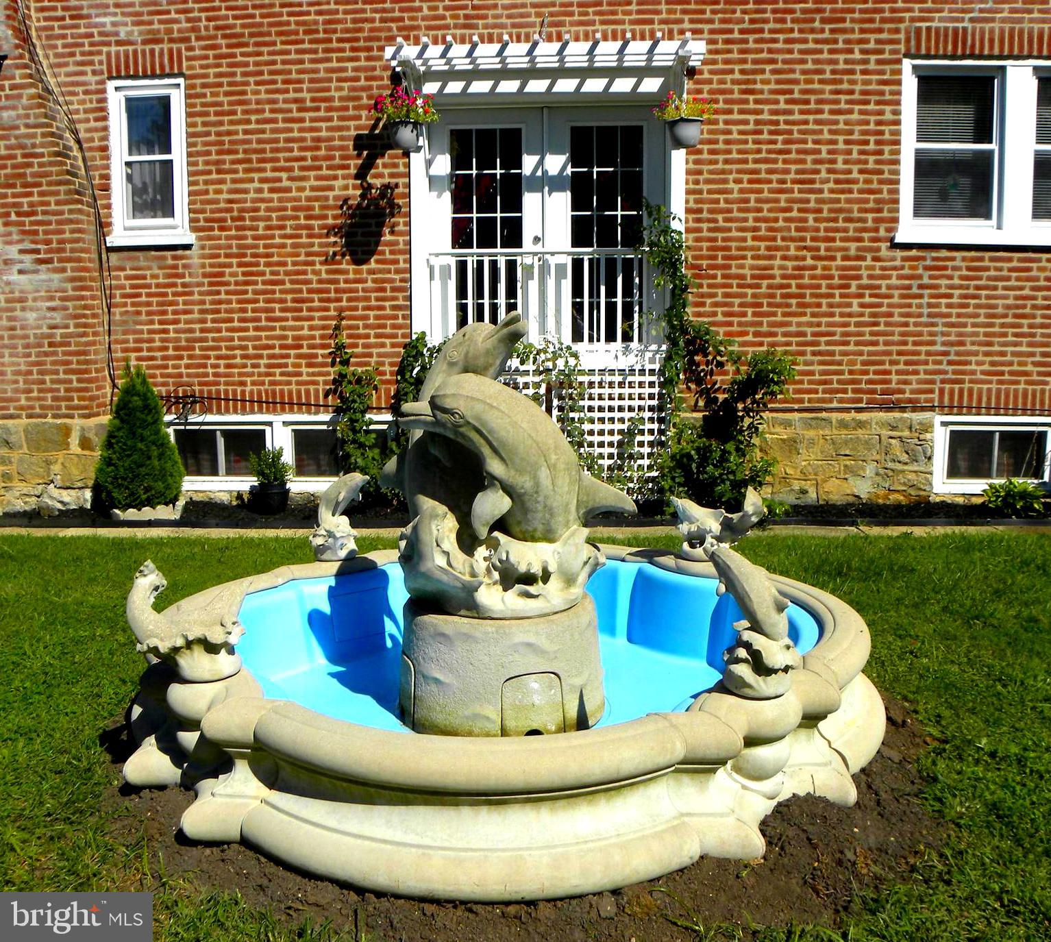 123 East Avon Road Brookhaven, PA 19015 - Photo 12 of 51 Grande Millenial Dolphin Fountain!