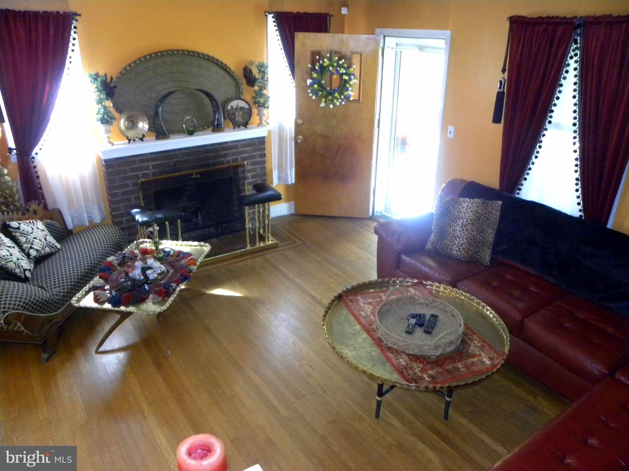 123 East Avon Road Brookhaven, PA 19015 - Photo 19 of 51 Gas log FP w/brick and tile hearth!