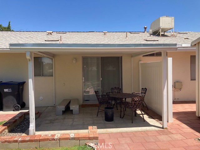 25801 McCall Boulevard Menifee, CA 92586 - Photo 4 of 15 a view of a dinning table and chairs in the patio