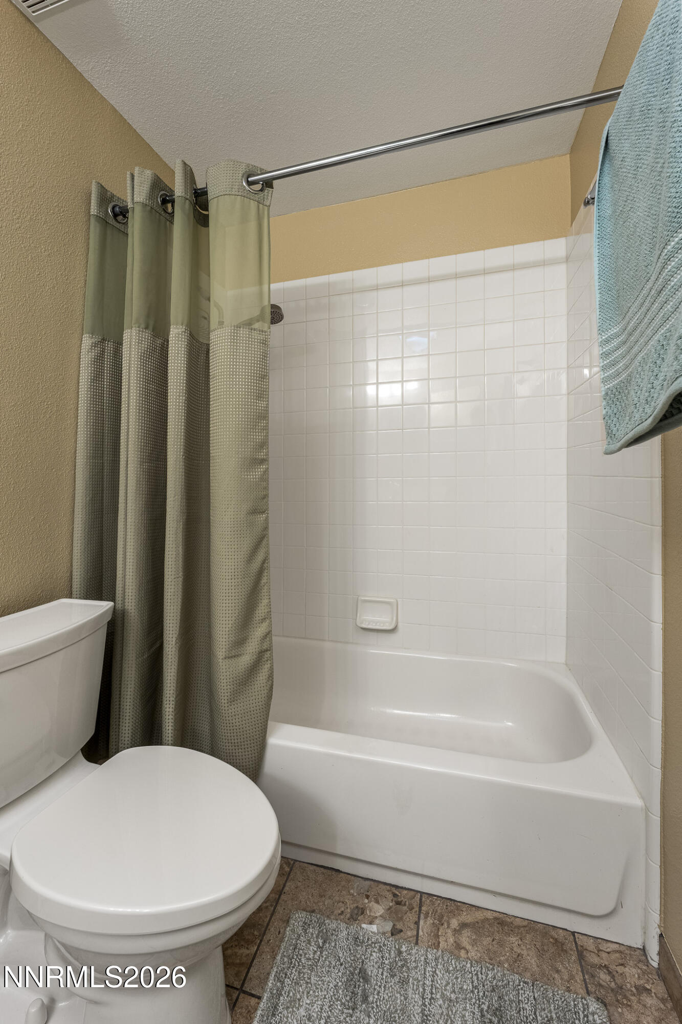 1840 Hunter Creek Road Reno, NV 89519 - Photo 24 of 39 a bathroom with a toilet and a shower