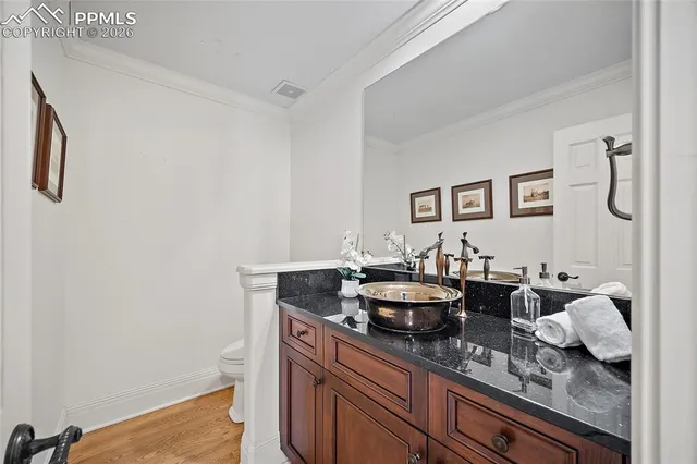 a view of a kitchen area with granite countertop lots of counter top space and furniture