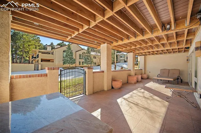 a bedroom with furniture and a chandelier