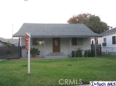 a house view with a garden space