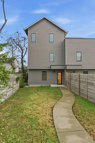 a view of a backyard with a small cabin
