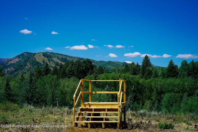 a view of a lake and green space